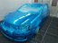 VW Golf VI v lakovacom boxe, predný pohľad, nalakovaný farbou Candy Cobalt Blue